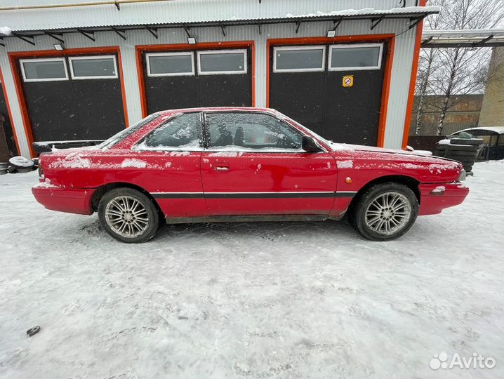 Суппорт передний правый левый Мазда 626 GD 1991