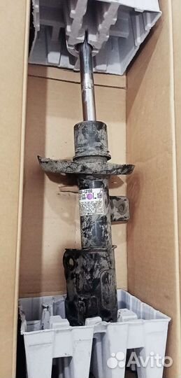 Стойка амортизатора Kia K5 2020г передняя левая