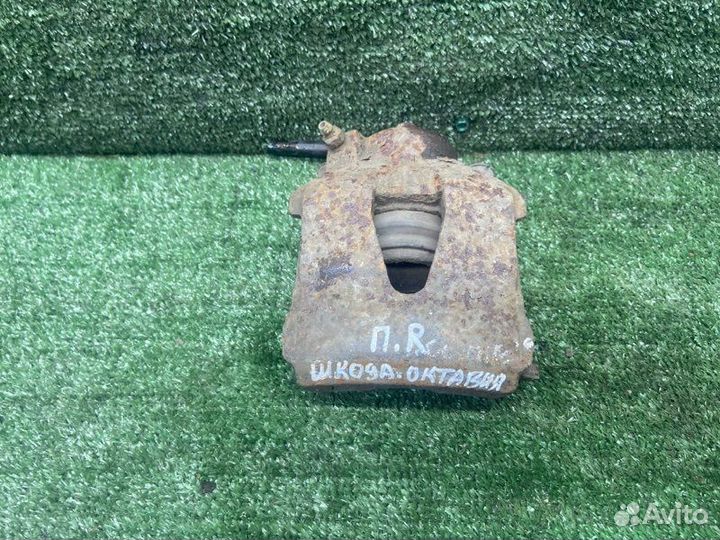 Суппорт тормозной передний правый Skoda Octavia 1