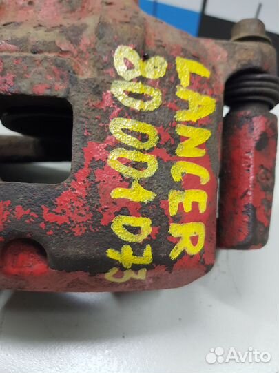 Суппорт перед. левый Mitsubishi Lancer (2007-2017)