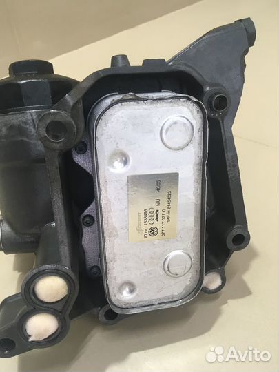 Корпус масляного фильтра Audi A8 D2 077115401J
