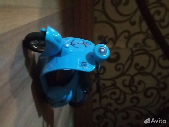 Игрушечный мотопед