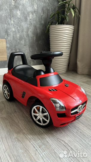 Детская машинка каталка с музыкой