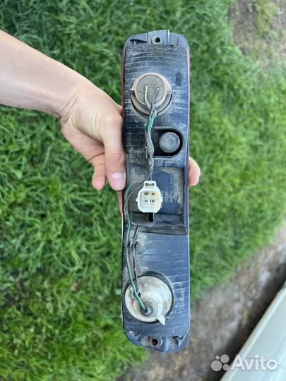 Фонарь левый задний в бампер Mitsubishi Pajero 3