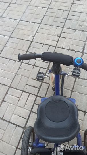 Трехколесный велосипед с ручкой