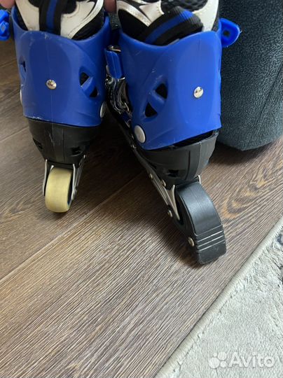 Роликовые коньки