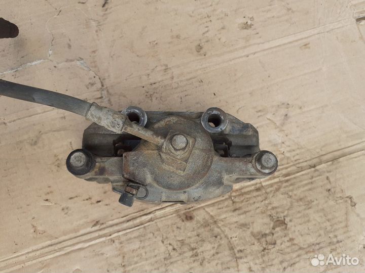 Суппорт тормозной передний правый Шероле Ланос