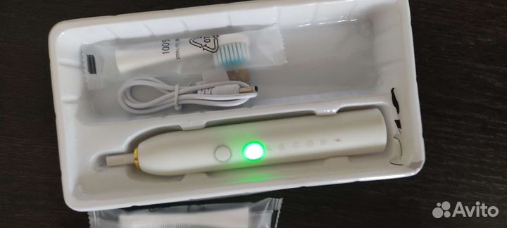 Электрическая зубная щётка