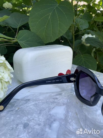 Солнечные очки женские