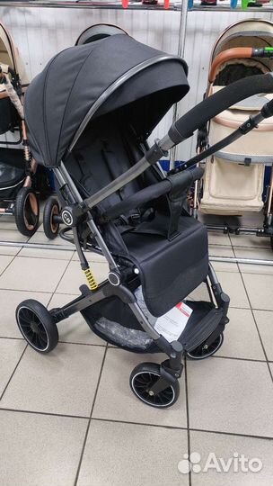 Прогулочная коляска с перекидной ручкой luxmom525