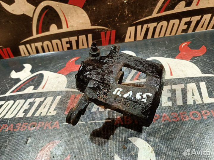 Суппорт тормозной передний левый Chevrolet Aveo