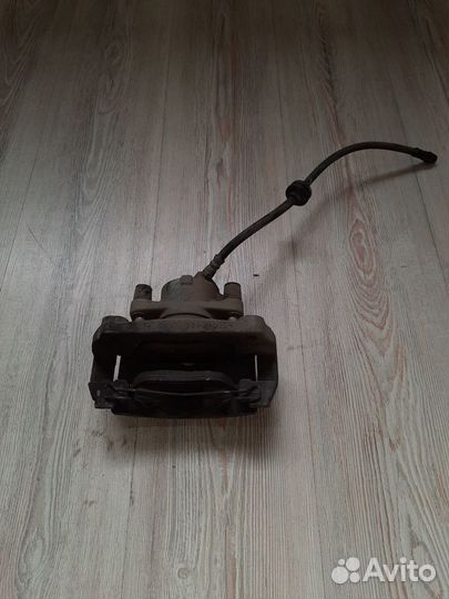 Суппорт тормозной перед Renault megane 3