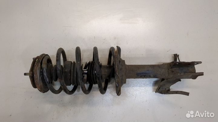 Амортизатор подвески Nissan Almera N16, 2004