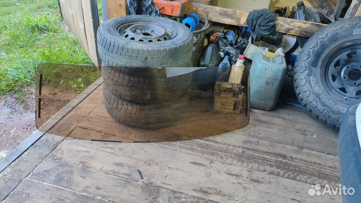 Стекло заднее Волга 3110