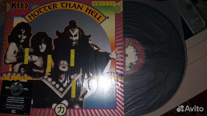 Пластинки Eric Clapton, Rolling Stones, Kiss, Ac/D