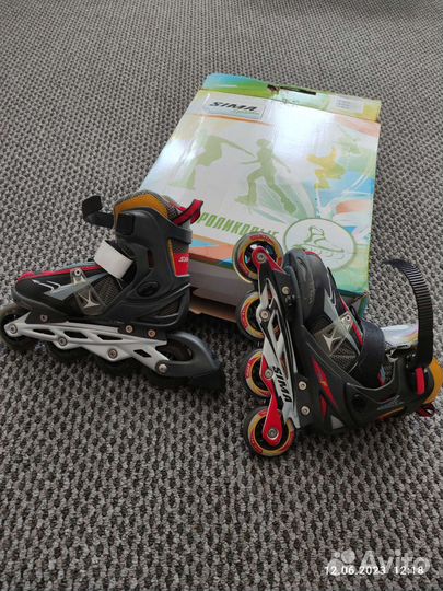 Роликовые коньки