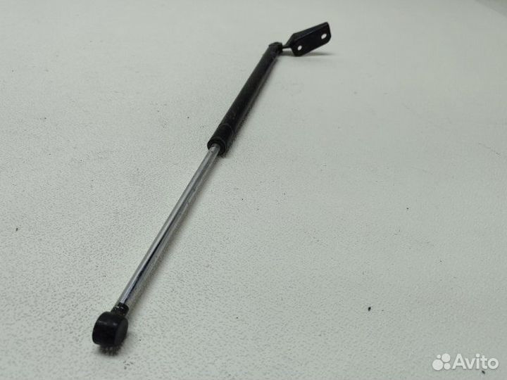 Амортизатор крышки багажника задний правый Nissan