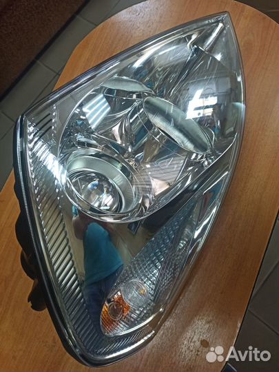 Фара передняя левая KIA carnival 2008