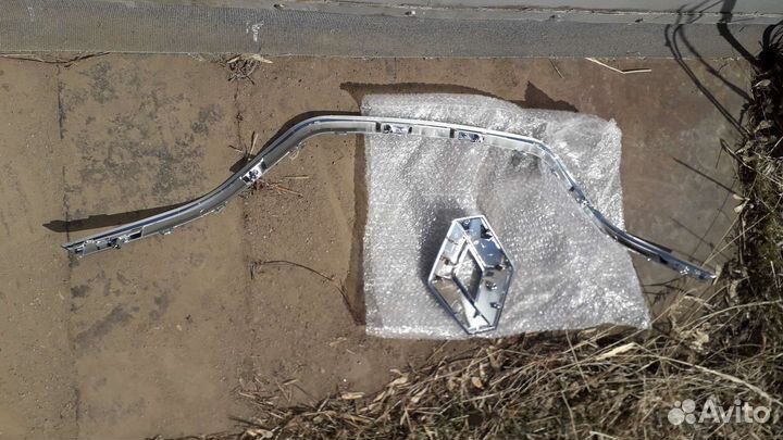 Эмблема птф Рено каптюр