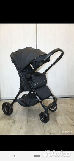 Новая коляска с перекидной ручкой Gretta(black)