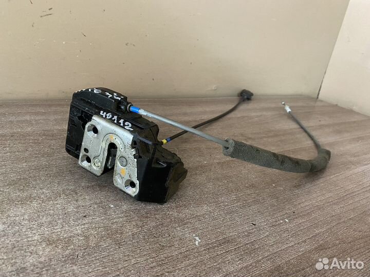 Замок двери задний левый Nissan Note E11