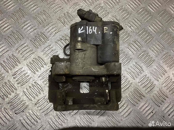 Суппорт задний правый Volkswagen Passat