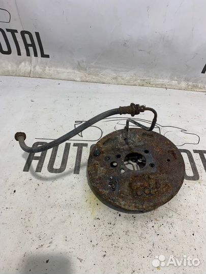 Тормозной механизм правый Nissan Almera Classic