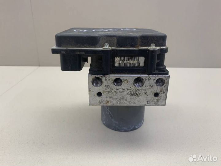 Блок управления тормозами/насос ABS Land Rover Dis