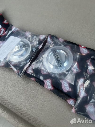 Колпачки на литые диски nissan