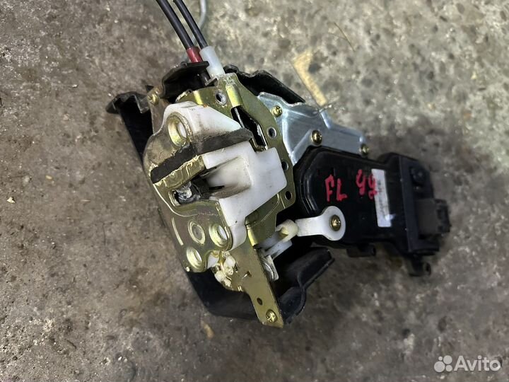 Замок двери передней левой mazda 6 gg