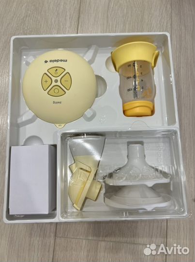 Молокоотсос электрический medela swing flex