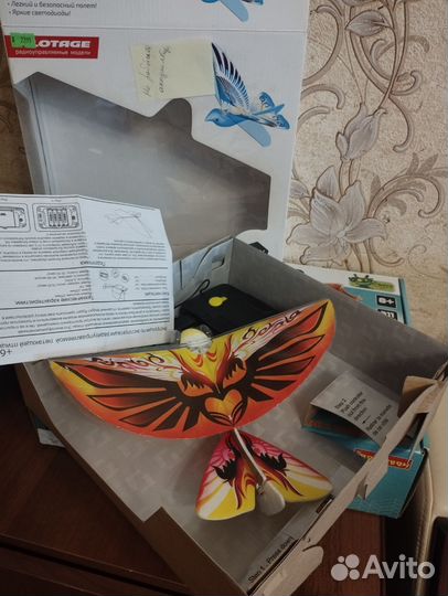 Птица игрушка