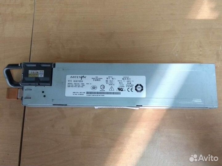 Блок питания IBM 670W (Artesyn) 7001134-Y000 для