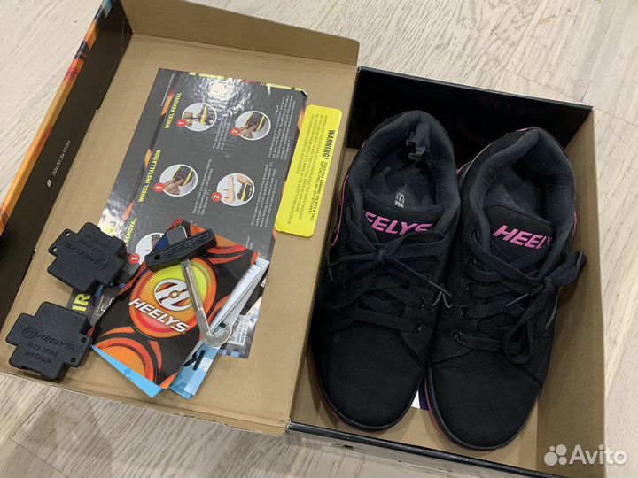 Кроссовки на роликах heelys