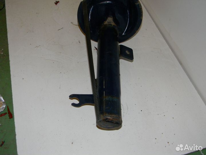 Стойка амартизатора передняя лева форд фокус 1 1.8