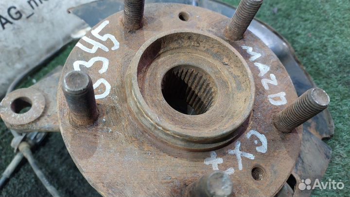 Кулак поворотный передний левый CX-7 2.3