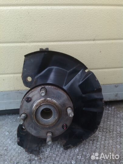 Киа Рио 2 левый поворотный кулак