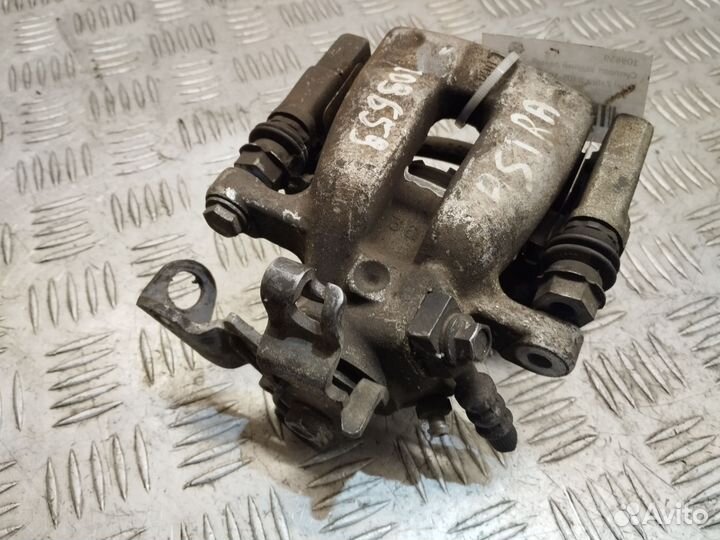 Суппорт задний левый Opel Zafira B