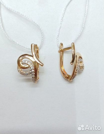 Золотые серьги с камнем