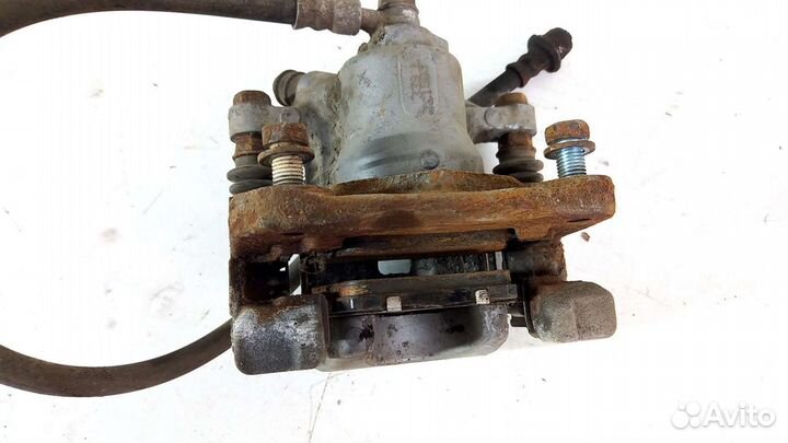 Суппорт задний правый Toyota Camry XV50