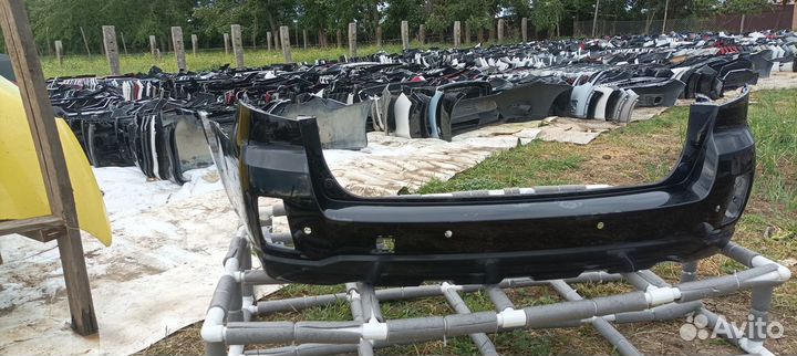 Бампер задний Subaru Legacy Outback 57704AJ020