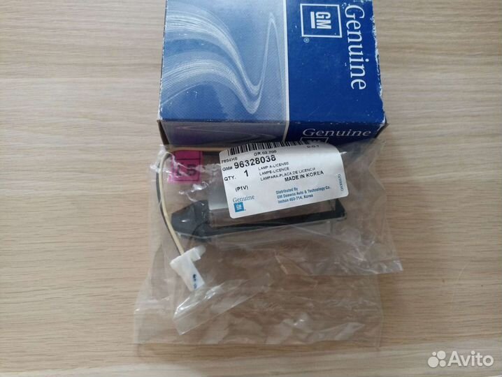 Фонарь подсветки номера Шевроле Evanda