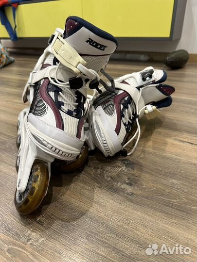Роликовые коньки