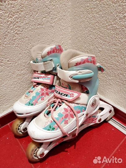 Роликовые коньки