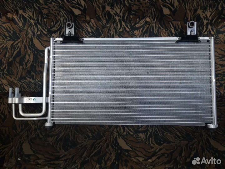 Радиатор кондиционера KIA spectra