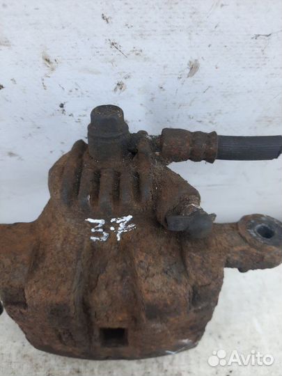 Суппорт тормозной задний левый Kia Sorento