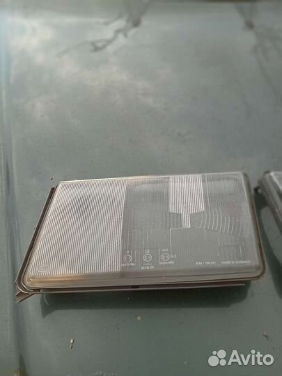 Стекла фар hella w124