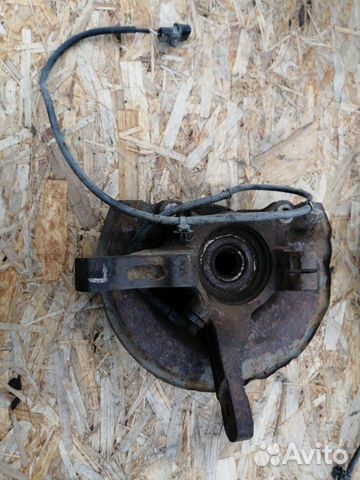 Кулак поворотный передний левый Mitsubishi Lancer