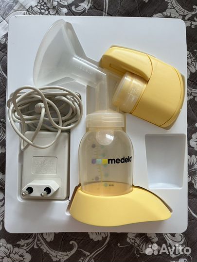 Молокоотсос medela mini electric