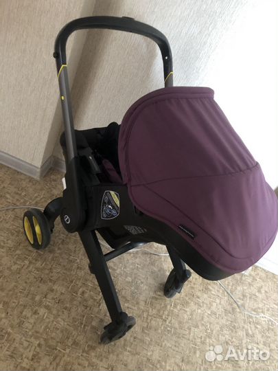 Автолюлька на колесах doona